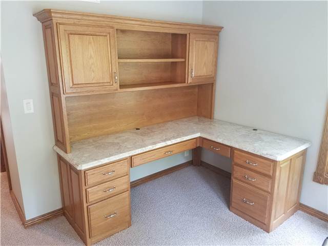 Hickory desk with a laminate countertop